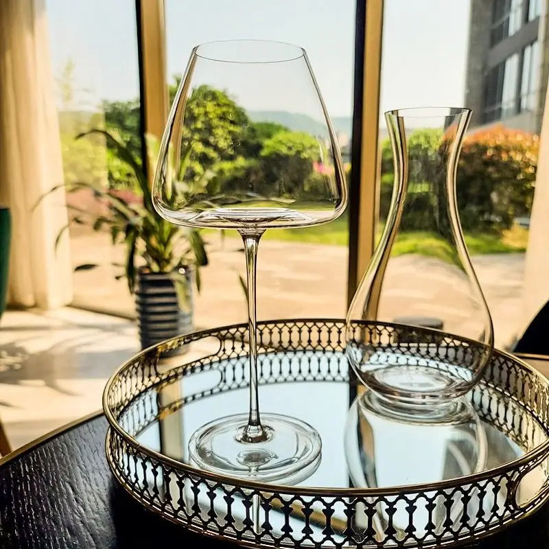 Clear crystal glasses designed for red wine, white wine, and champagne