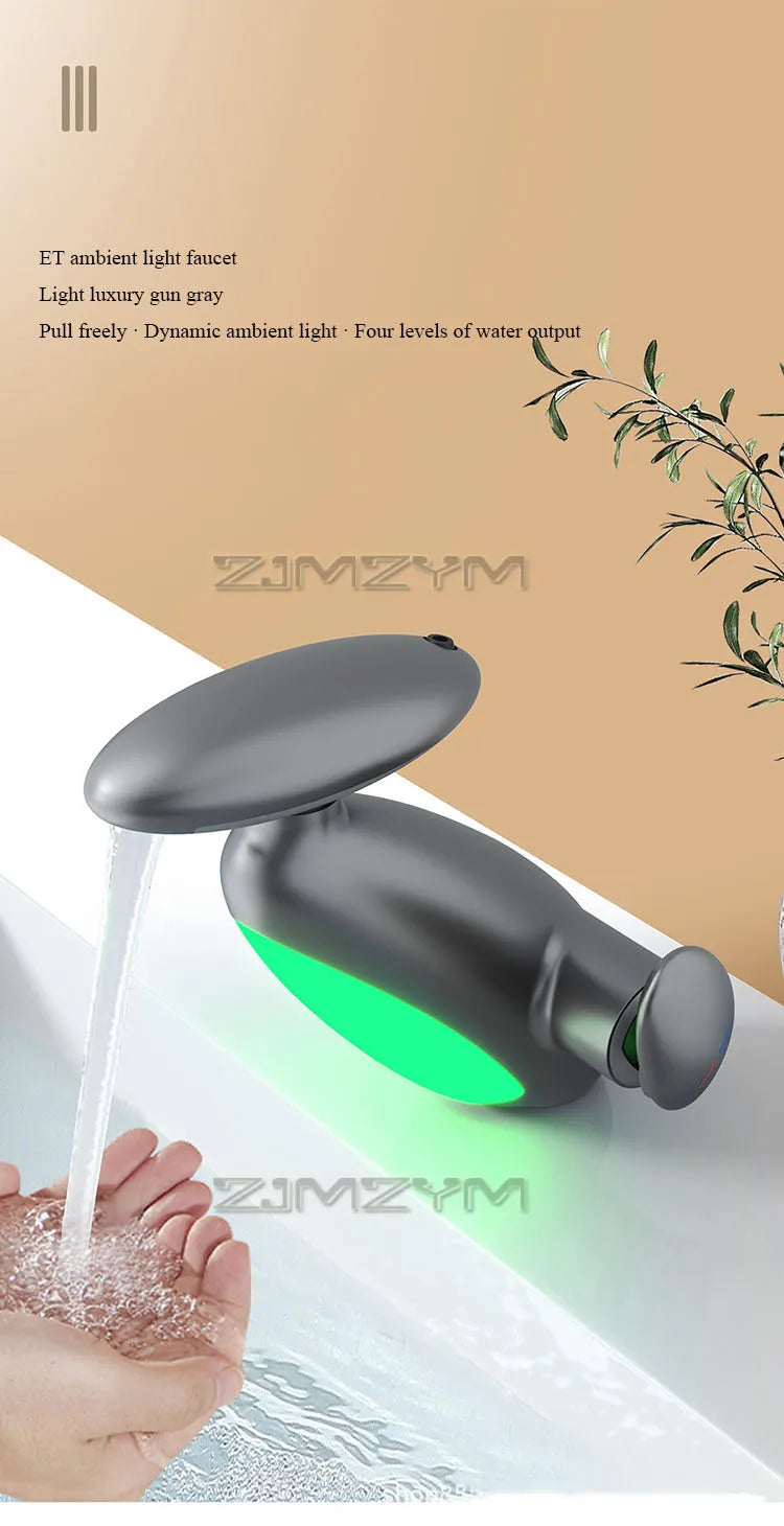 Green LED bathroom faucet with ambient lighting and dynamic water flow. Luxury sink fixture with adjustable water output levels.